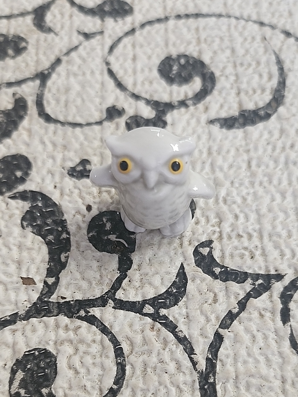Minature Bug House Owl with Yellow Eyes